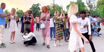 അയ്യയ്യേ നാണക്കേട്; റഷ്യൻ യുവതിക്ക് ചുറ്റും ഡാൻസ് ചെയ്ത് ഇന്ത്യൻ യുവാവ്, അസ്വസ്ഥയായി മാറിപ്പോയി യുവതി